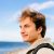happy-man-smiling-while-standing-on-beach-against-DANCP25.jpg happy-man-smiling-while-standing-on-beach-against-DANCP25.jpg